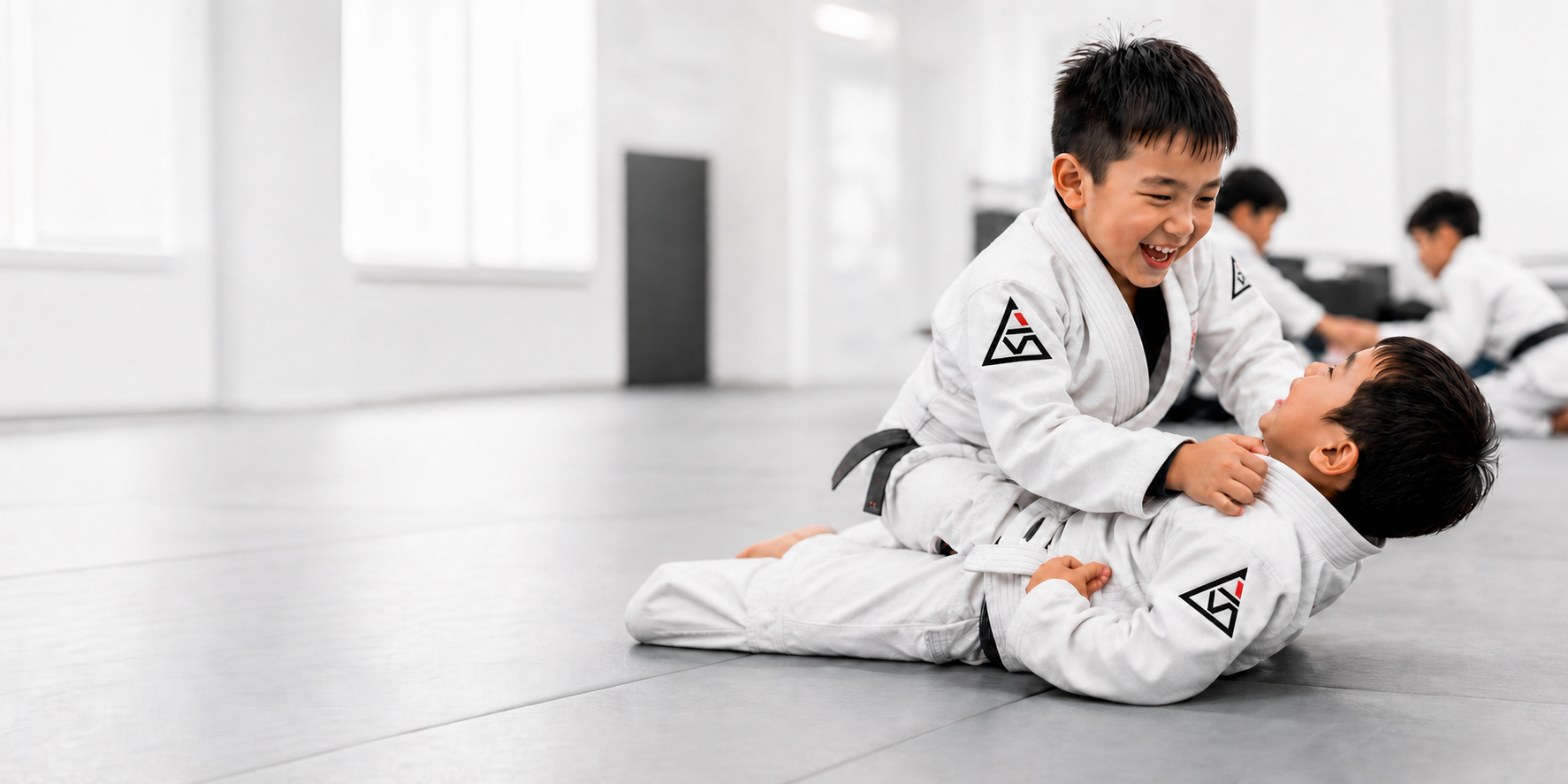 Adaptiv kids practicing Jiu-Jitsu together